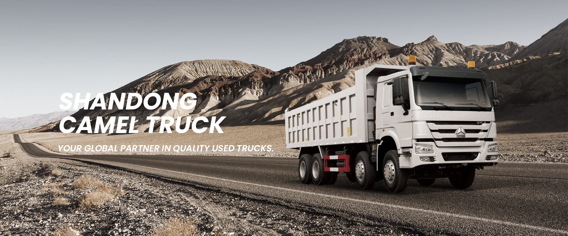 Heavy-duty dump truck on a mountain road